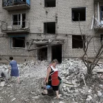 Dozens Feared Trapped After Russian Strike On Ukraine Apartment Building