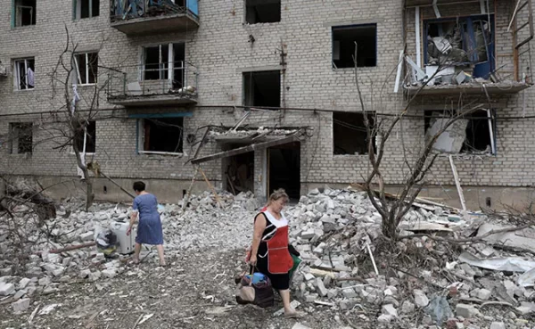 Dozens Feared Trapped After Russian Strike On Ukraine Apartment Building