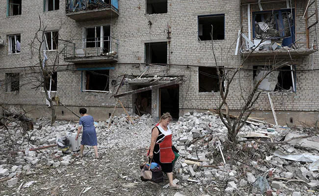 Dozens Feared Trapped After Russian Strike On Ukraine Apartment Building