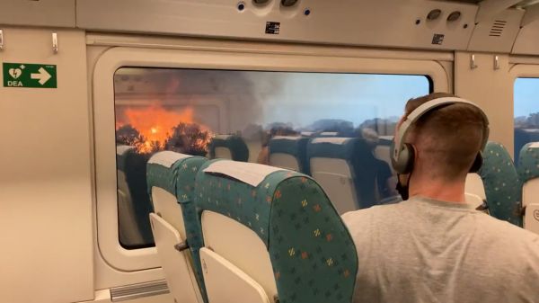 On Camera, Wildfire Surrounds Passenger Train In Spain Amid Europe's Heatwave